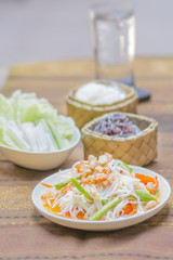 papaya salad or what we called in Thai  "Som Tum Thai"  the popular Thai style local the eastern delicious food of Thailand.