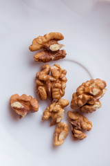Close-up walnut on a white background. Macro shot.