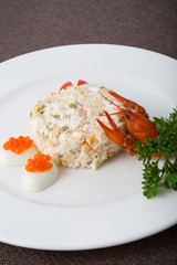 Russian salad with crayfish