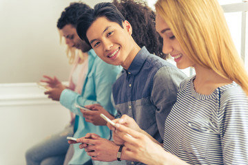 Fototapeta premium Young people with gadgets