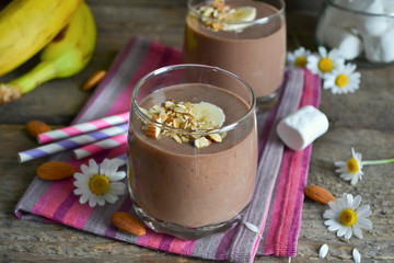 Chocolate smoothie with banana, oatmeal, almonds and marshmallow