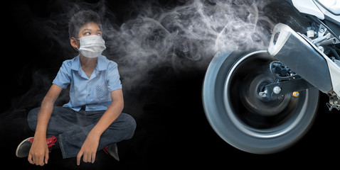 Smoke pollutes the motorcycle on the road and healthy people