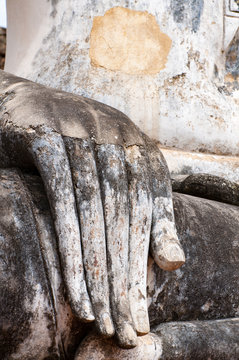 Close up ancient hand of buddha at Sukhothai Historical Park, Th