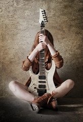 girl with electric guitar rock