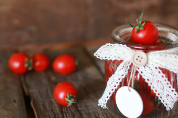 fresh tomato cherry in a glass jar