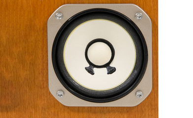 closeup of a loudspeaker in a wooden box on white background