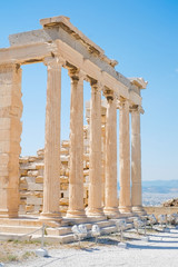 Obraz premium Famous Greek temple pillars against clear blue sky in Greece