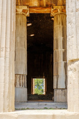 Fototapeta na wymiar Looking up view of famous Greek temple pillars in Greece