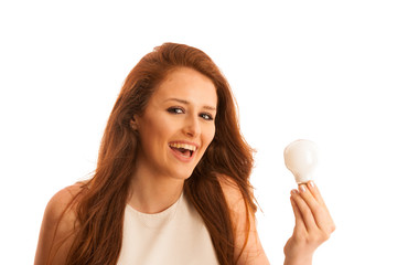 Woman with lightbulb as a sign for fresh idea