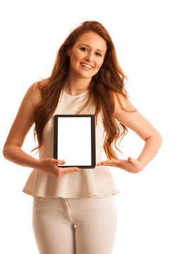 Business woman brousing the web on a tablet isolated over white