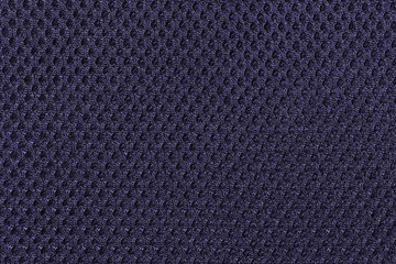 Purple and violet fishnet cloth material as a texture background. Purple and violet nylon texture for design with copy space for text or image.