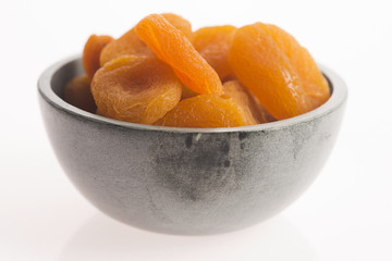 Delicious dried apricots in a bowl