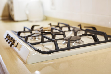 furniture background. Gas plate on a stone surface in the kitchen