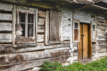 Old ruined house with collapsed roof