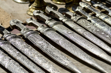 many knifes with ornament