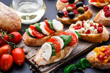 Bruschetta with tomatoes, mozzarella and basil