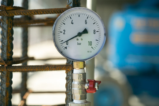 Pressure gauge or sensor on the piping system