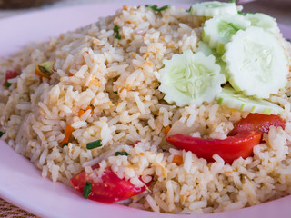 fried rice with cucumber on topping