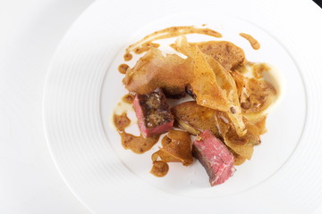 Fine dining, Beef ribs with Foie Gras and Jerusalem artichoke chips