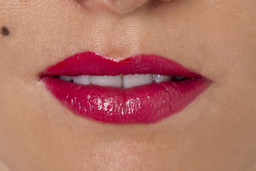 a woman's lips with pink lipstick