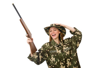 Girl in military uniform holding the gun isolated on white