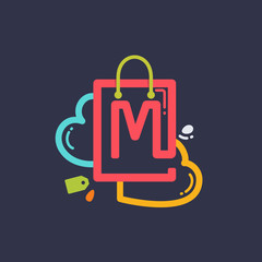 M letter with shopping bag and hearts icon.