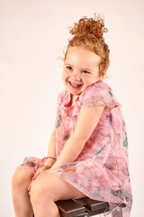 Little Girl Fashion Model in Rose Dress