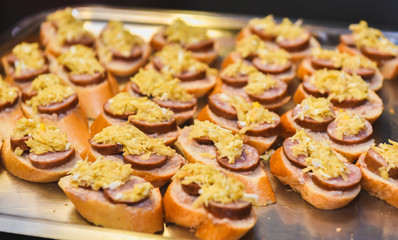 Obraz na płótnie Canvas Home made canapes small sandwiches appetizers