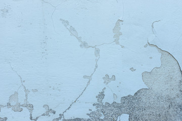 Wall fragment with scratches and cracks