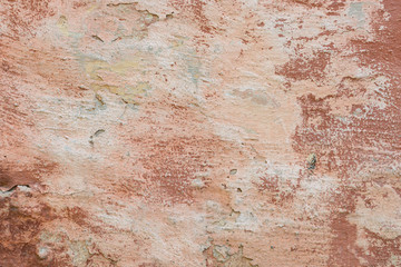 Wall fragment with scratches and cracks