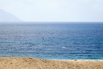 Kite on the empty beach in Atlantic