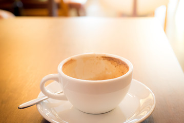 Coffee cup  wooden table.