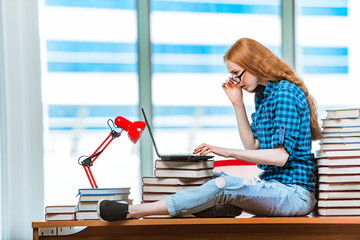 Young female student preparing for exams