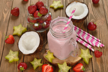 Refreshing cocktail with coconut milk and strawberries