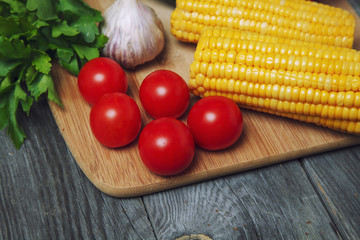 Group of fresh vegetables on a wooden background