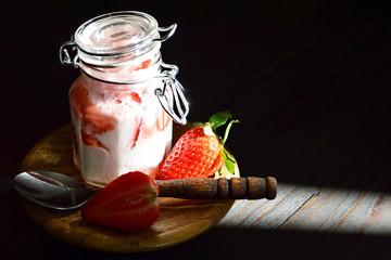 Fresh strawberry yoghurt in the jar