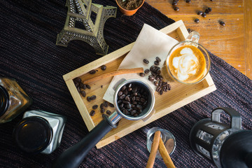 Top view coffee with cinnamon, anise and cane sugar and Paris mo