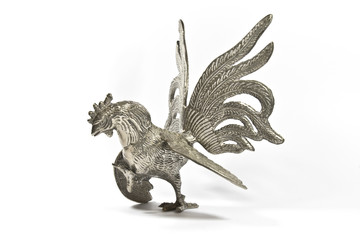Silver Cockerel Statue on White Background © squeebcreative