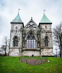 Fototapeta na wymiar Exterior of the famous Stavanger Domkirke on cloudy spring day