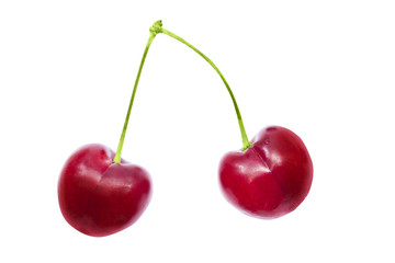 Fototapeta na wymiar Two cherries on a white background with clipping path. Ripe cherries isolated. Two cherry berry fruits isolated on white background. Sweet cherry. Red cherry. Cherries on white. Cherry isolated.