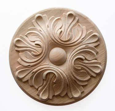element woodcarving. furniture in classic style. white tree with gold trim. patina. carving. small depth of field. luxury furniture. isolated on the white background