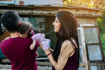 young family with a child on the nature