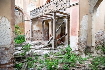 inside of ruined brick Catholic church