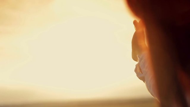 Hands of men  and women at sunset