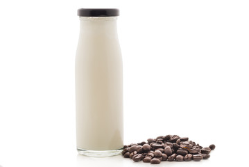 bottle milk and coffee bean on isolated


