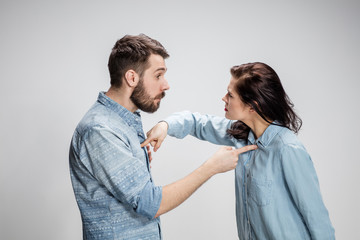 The young couple with different emotions during conflict