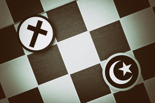 Christianity And Islam Symbols On Checkerboard 