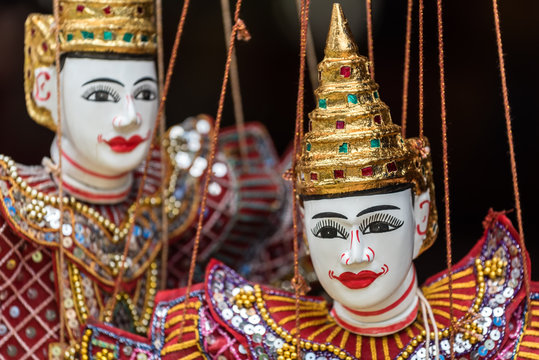 Asian dancer puppet dolls (selective focus on front doll's face only)