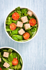 Vegan tofu salad with tomatoes and lamb's lettuce
in bowl