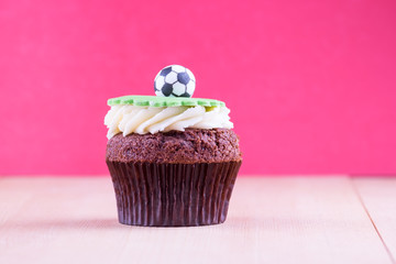 Delicious cupcake on table